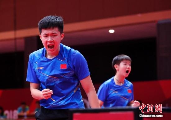 資料圖：雅加達(dá)亞運(yùn)會(huì)，王楚欽/孫穎莎奪得混雙冠軍。 <a target='_blank' href='/'>中新社</a>記者 劉關(guān)關(guān) 攝